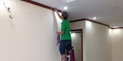 quy trình làm sạch tường nhà cửa